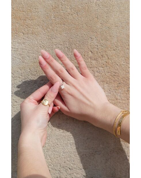 Ring aus silbernem Klee und Perlmutt aus Messing