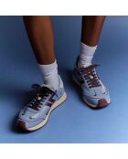 Baskets Omega bleues