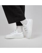 Sneakers bianche con velcro