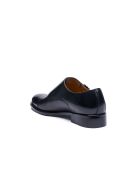 Chaussures à double boucle à bout droit en cuir noires