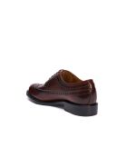 Derbies à bout golf en cuir bruns