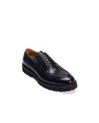 Derbies à plateau en cuir noirs