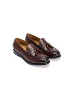 Mocassins à pompons en cuir bruns