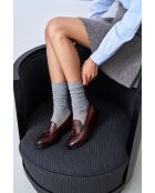 Mocassins à pompons en cuir bruns