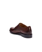 braune Lederschuhe mit doppelter Schnalle und gerader Zehenpartie
