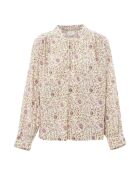 Blusa marfil lírica