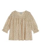 Blusa bianca ricamata con Daisy