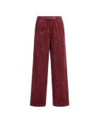 Pantaloni larghi elasticizzati bordeaux in velluto a coste