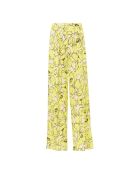 Gelbe Hose mit fließendem Rand und Blumendruck