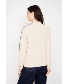 Jersey de cuello alto color crema