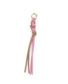 Bijou de sac en cuir Twist rose et beige