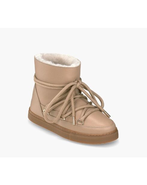Beigefarbene Keilstiefel aus Vollleder