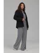 Tuta grigia con zip
