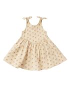 Beiges kurzes Sommerkleid aus Baumwolle mit Blumenmuster