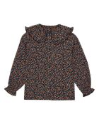 Blusa rossa a maniche lunghe a fiori