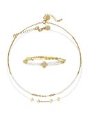 Halsketten und Armbänder aus goldenem und weißem Schaumstoff