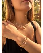 Halsketten und Armbänder aus goldenem und weißem Schaumstoff