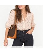 The Macadam Bucket trionfa Céline