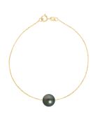 Geelgouden armband Tahitiaanse cultuurparel rond zwart tahiti