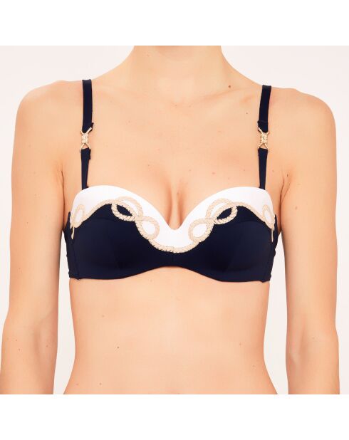 Blaues Badeanzugoberteil mit Muschelstirnband